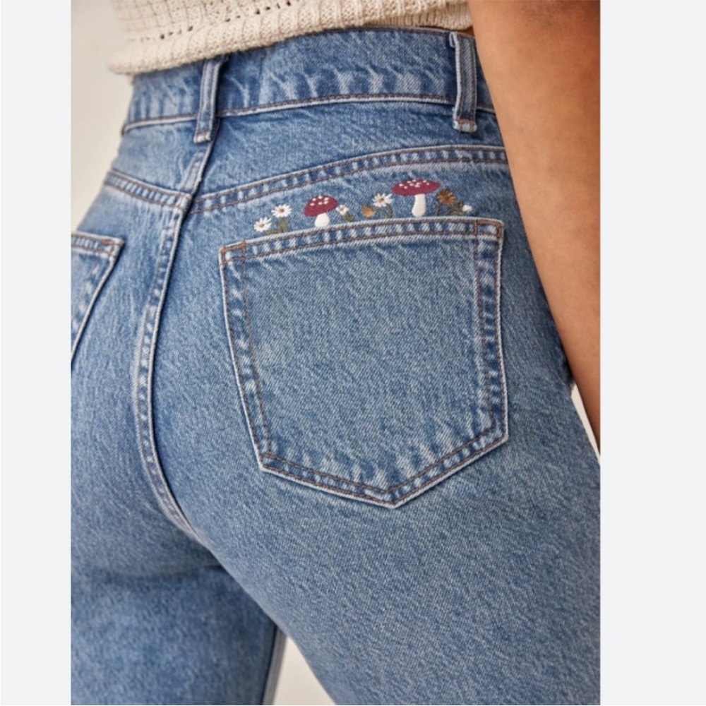 Reformation limited edition embroidered jeans.